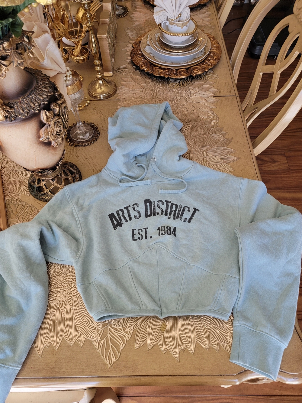 Light Blue Cropped Hoodie Vest with 'Arts District' Graphic